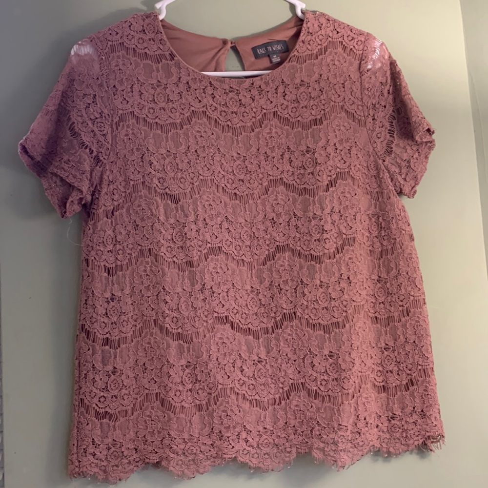 Dark pink blouse.